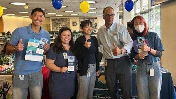 LADWP employees posed with our Business Development representative.
