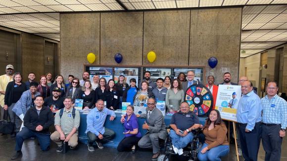 All the exhibitors posed for a photo at the Vendor Fair located at John Ferraro Building.