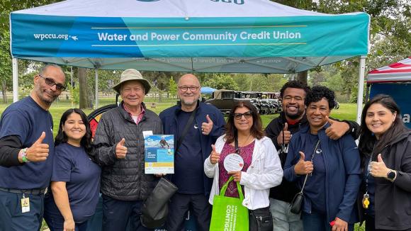Mike T., CEO, Patrice M., COO, LADWP retirees and WPCCU team members proudly promote the credit union at the annual LADWP Retirees Picnic.