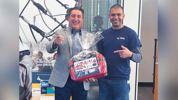 A member and the Hope St branch manager posing for a photo