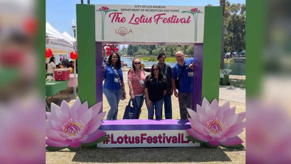 WPCCU staff posing for a photo at the Lotus Festival