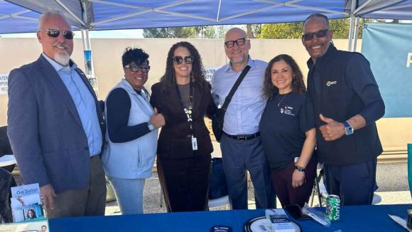 WPCCU staff taking a photo with Janisse Quiñones, Chief Executive Officer and Chief Engineer of the Los Angeles Department of Water and Power