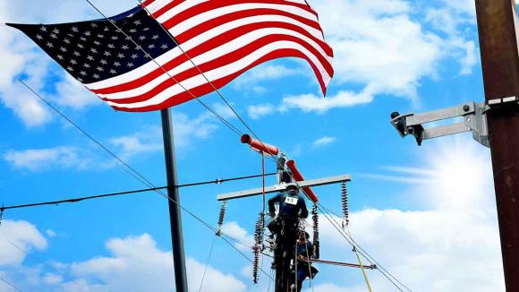 Linemen competing at the Linemen's Rodeo