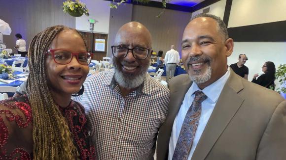 Annual Meeting attendees taking a selfie photo