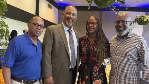 Annual Meeting attendees taking a selfie photo