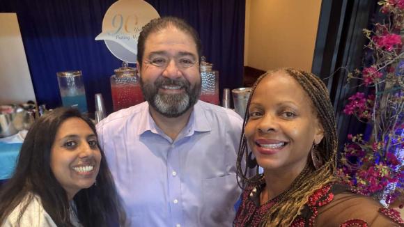 Annual Meeting attendees taking a selfie photo