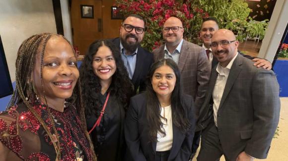 Annual Meeting attendees taking a selfie photo