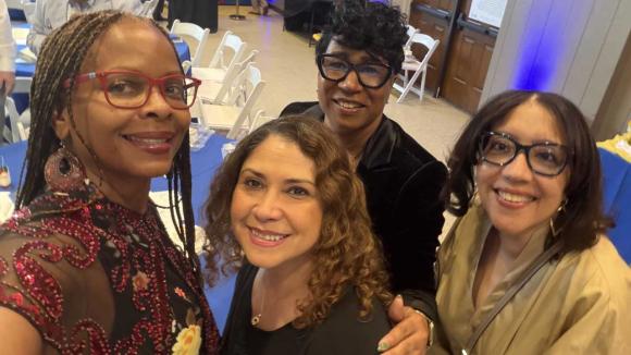 Annual Meeting attendees taking a selfie photo