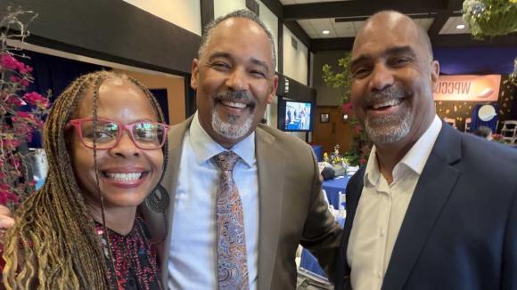 Annual Meeting attendees taking a selfie photo