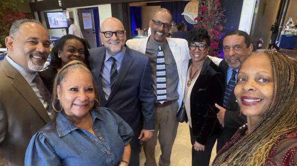 Annual Meeting attendees taking a selfie photo