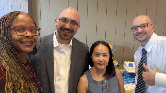 Annual Meeting attendees taking a selfie photo