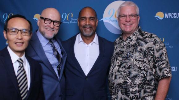 People taking a picture in a photobooth