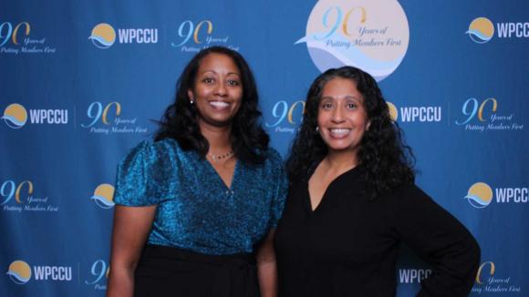 People taking a picture in a photobooth