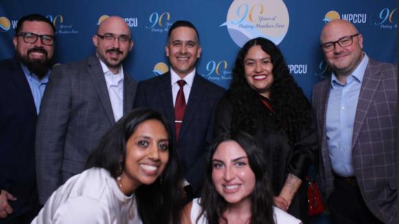 People taking a picture in a photobooth