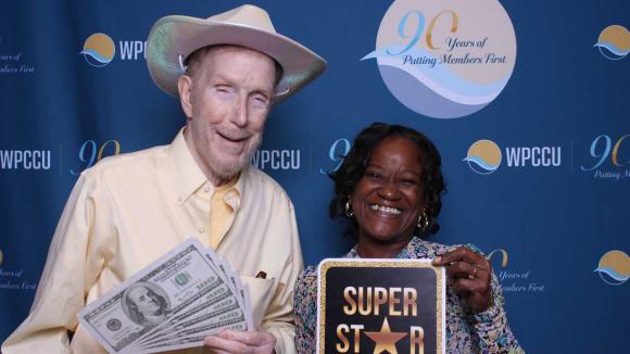 People taking a picture in a photobooth