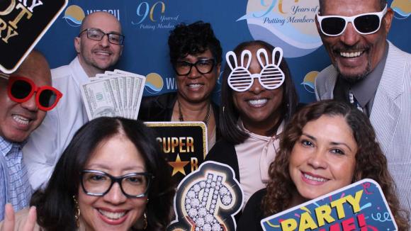 People taking a picture in a photobooth