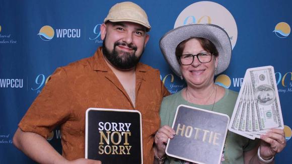 People taking a picture in a photobooth