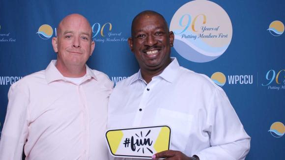 People taking a picture in a photobooth