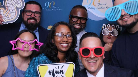People taking a picture in a photobooth