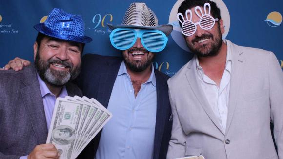 People taking a picture in a photobooth