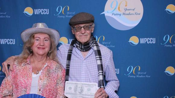 People taking a picture in a photobooth