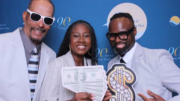 People taking a picture in a photobooth