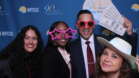 People taking a picture in a photobooth