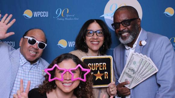 People taking a picture in a photobooth