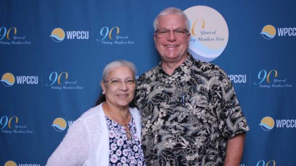 People taking a picture in a photobooth