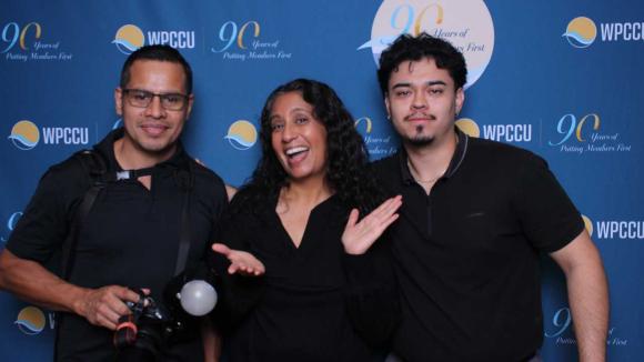 People taking a picture in a photobooth