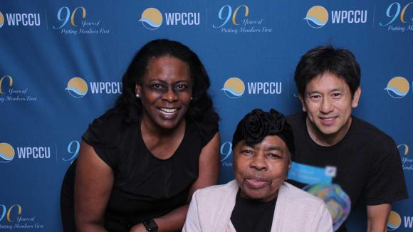 People taking a picture in a photobooth