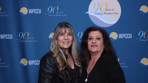 People taking a picture in a photobooth