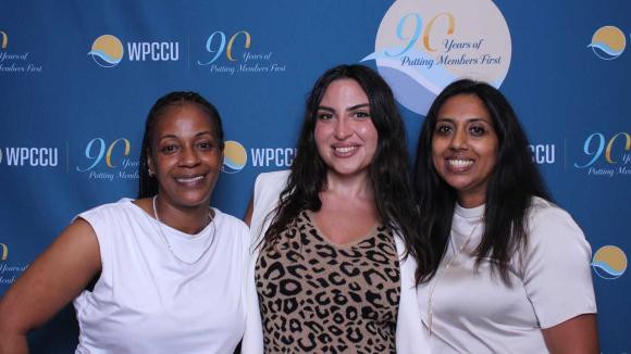 People taking a picture in a photobooth