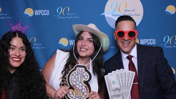 People taking a picture in a photobooth