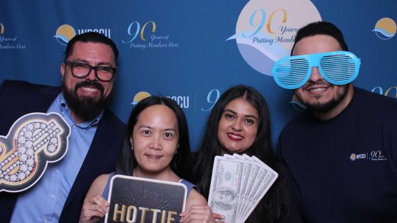 People taking a picture in a photobooth