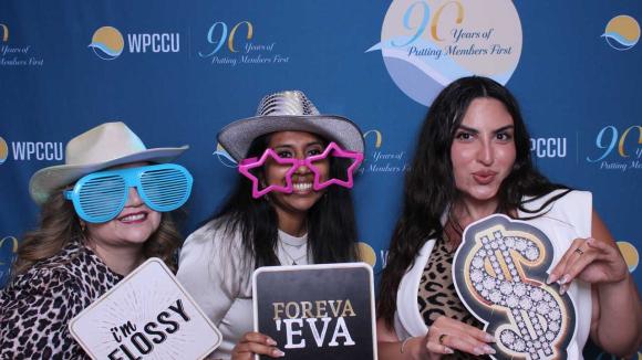 People taking a picture in a photobooth