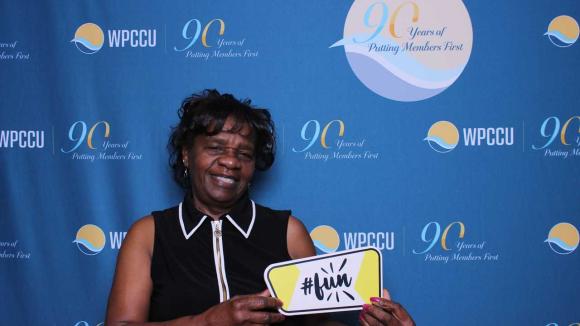 A person taking a picture in a photobooth