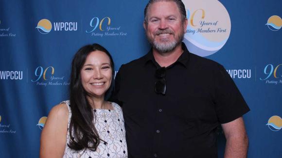 People taking a picture in a photobooth