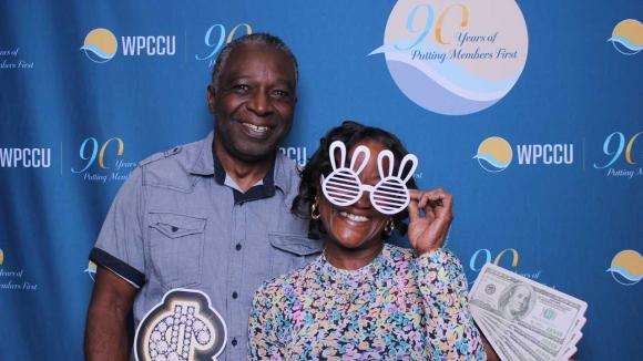 People taking a picture in a photobooth