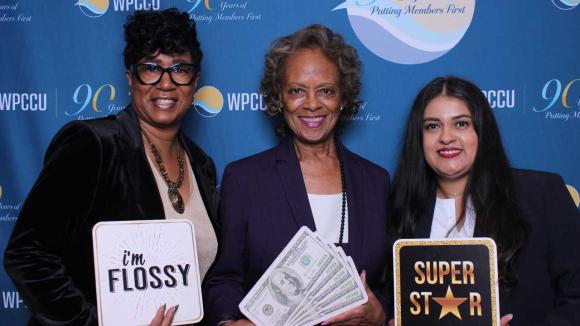 People taking a picture in a photobooth