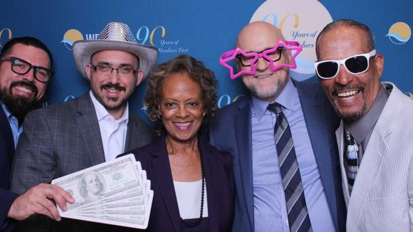 People taking a picture in a photobooth