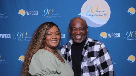 People taking a picture in a photobooth