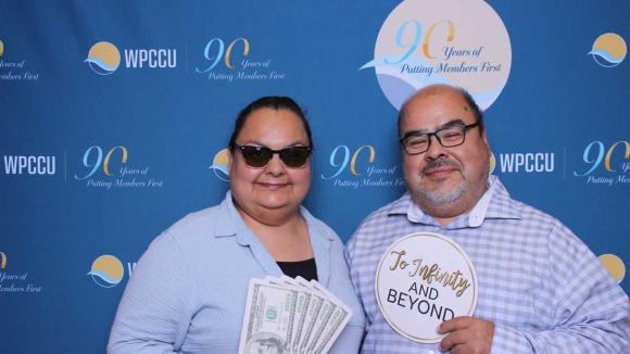 People taking a picture in a photobooth