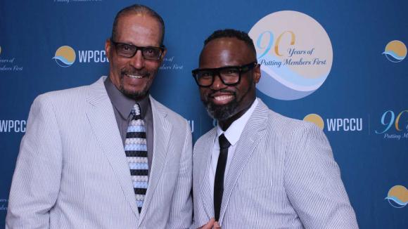 People taking a picture in a photobooth