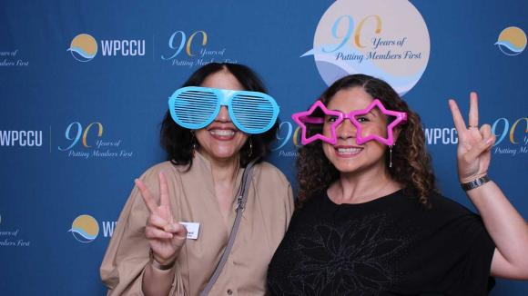 People taking a picture in a photobooth