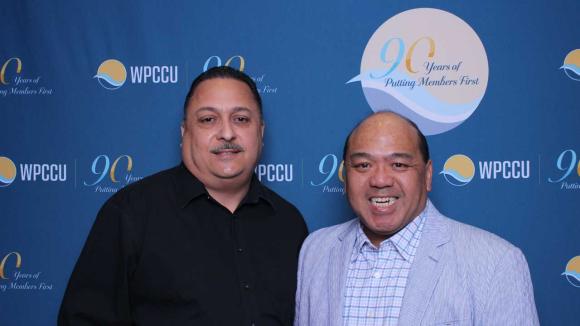 People taking a picture in a photobooth