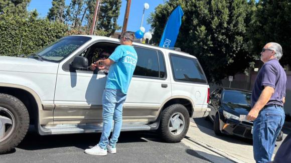 WPCCU staff helping a member