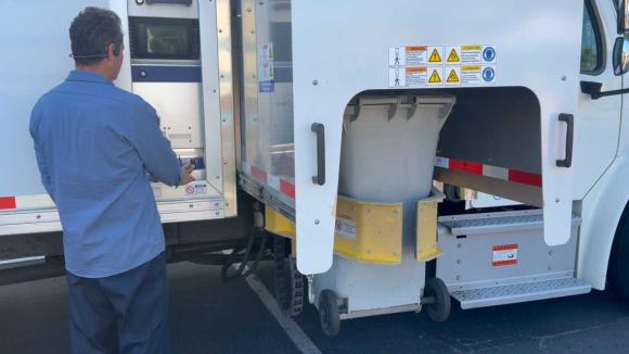 A close up of the paper shredding truck