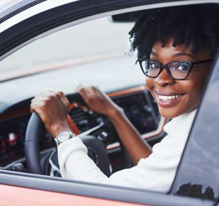 Person looking out of a car window.