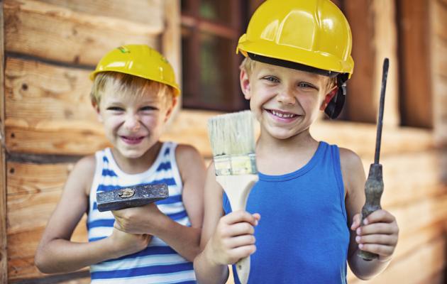 Two boys in hard hats